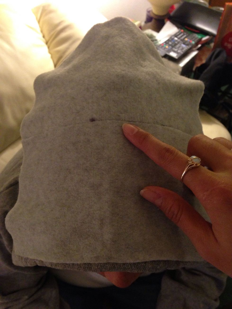 Now take the grey fleece and cut the width of the mouth 7in and cut up again i did the curve by eye. Lay it on top of ur model & align the bottom seam to make it straight. Find a center point and mark