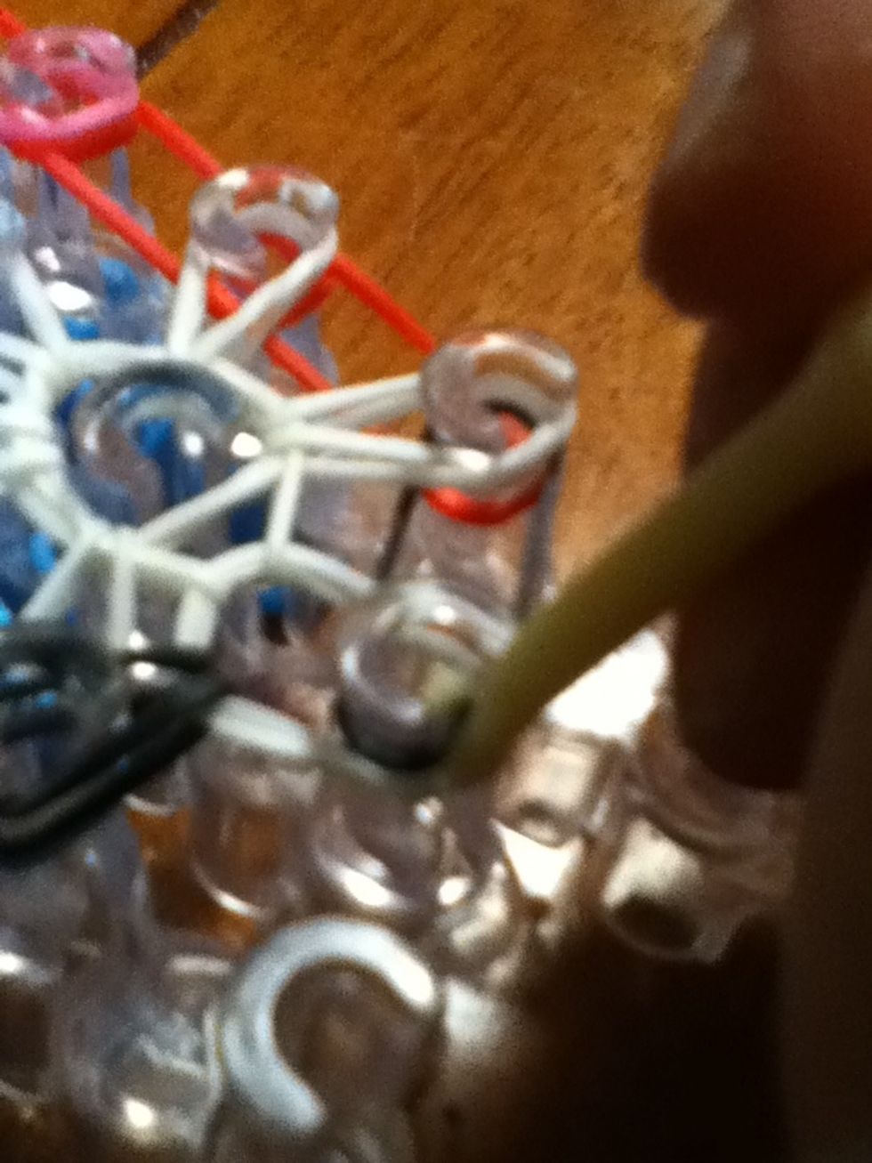 Now take the last band and flip it to the right side