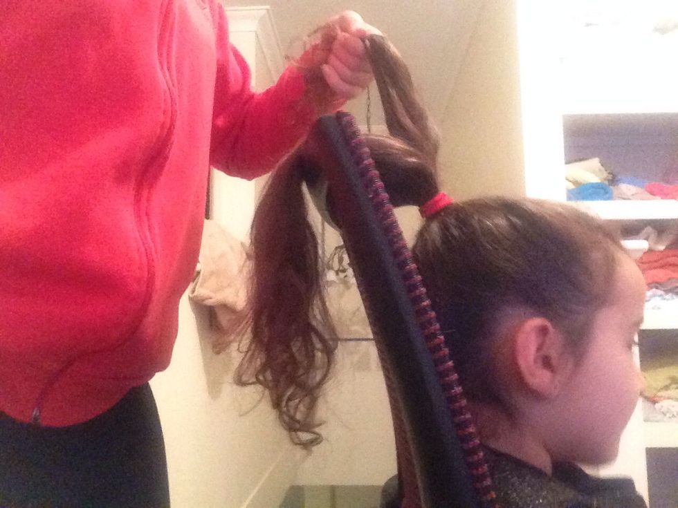 Now take the left side and also pull into the middle