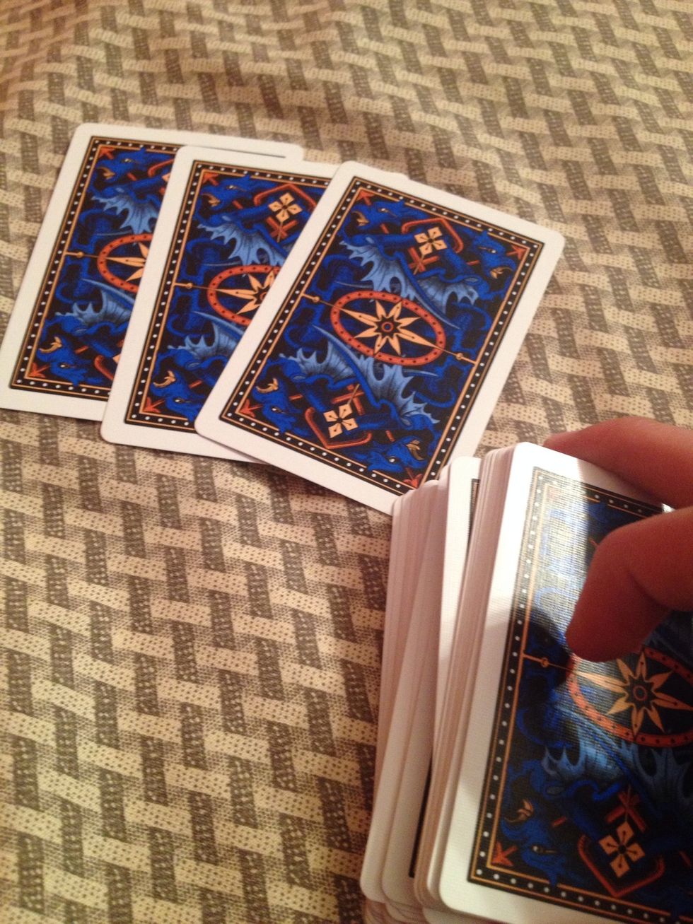 Now take the packet on the left and put it on top of the packet on the right.