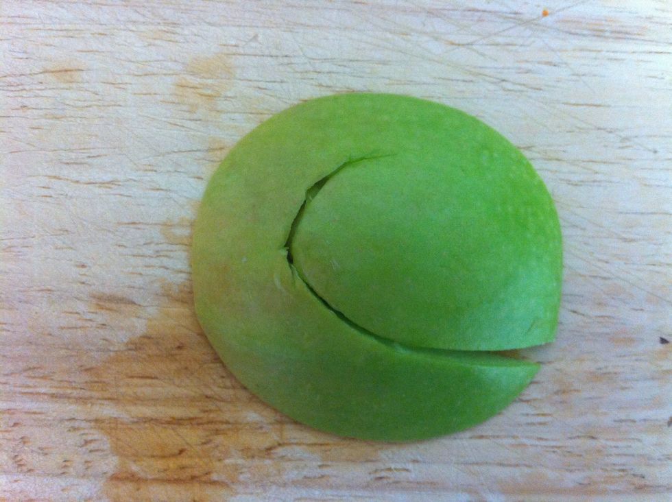 Now take the slice from the begining and cut a swan head