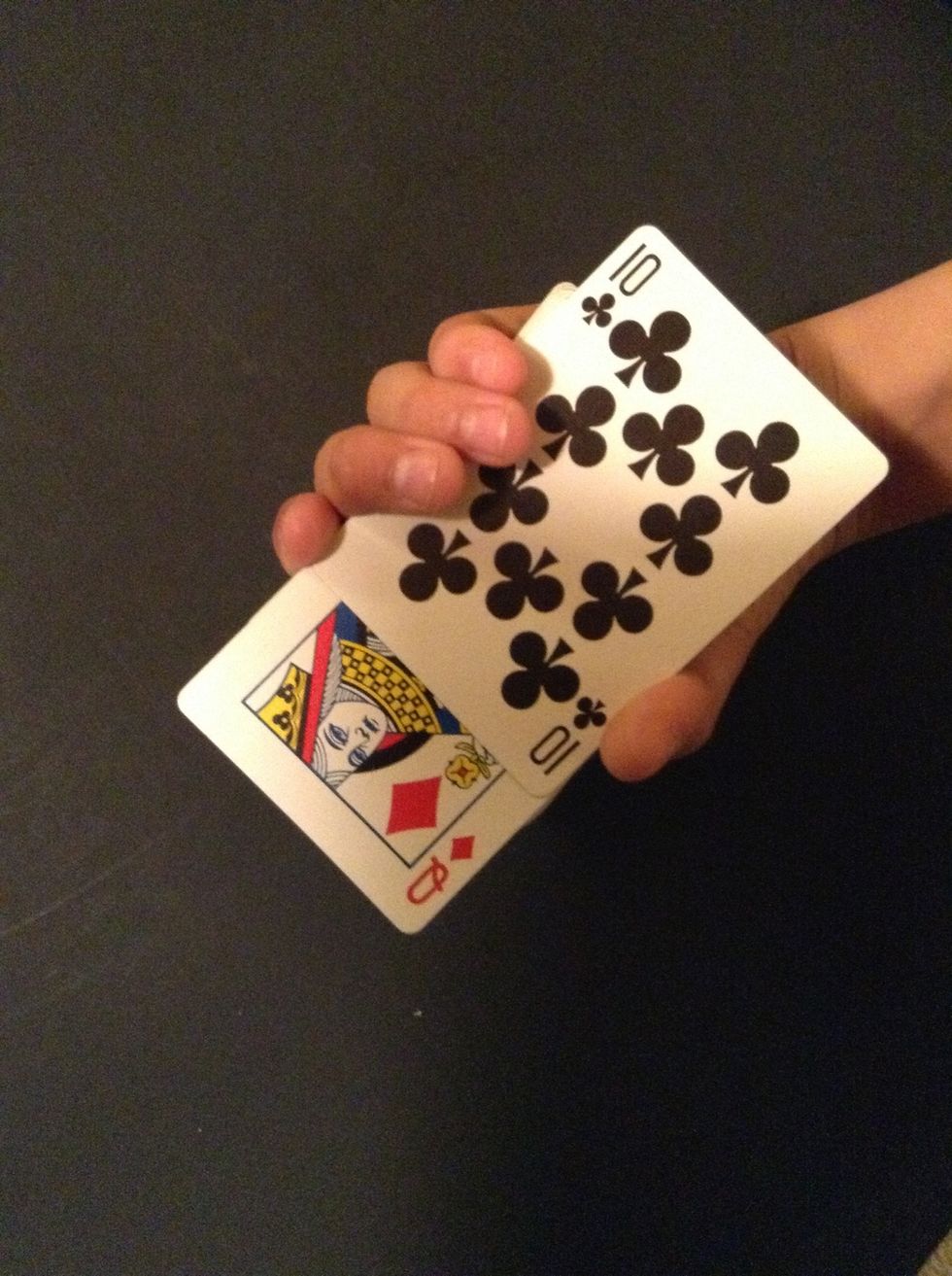 Now take their card and put it on the table face down.