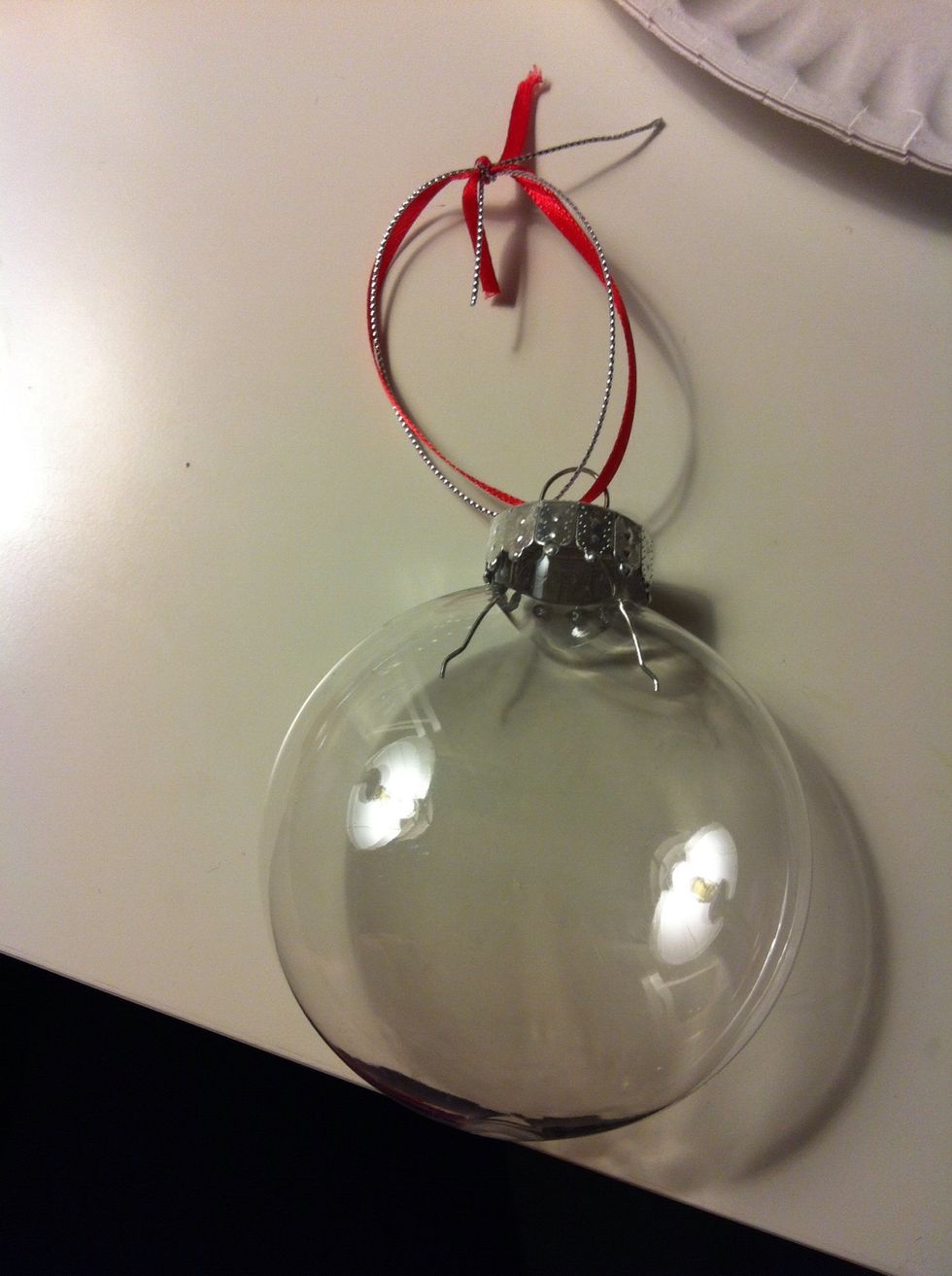 Now take two of the ribbon and cut them to the length you want it to hang