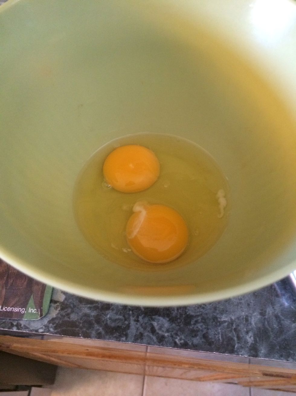 Now take your 2 eggs and add them to another bowl