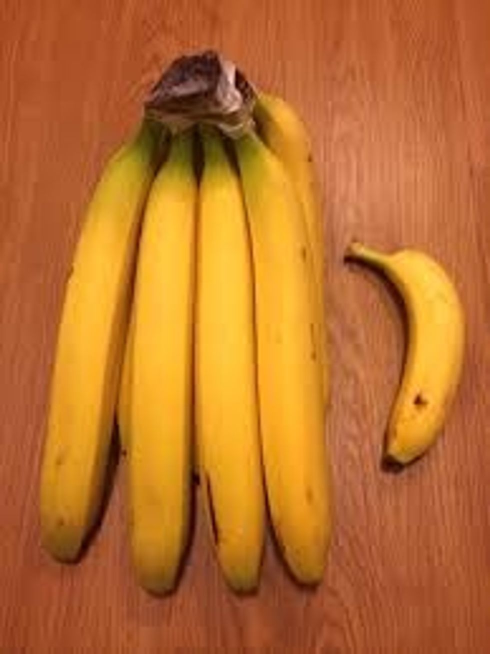 now take your bananas and un-peel them *don't mind that odd banana on the side lol*