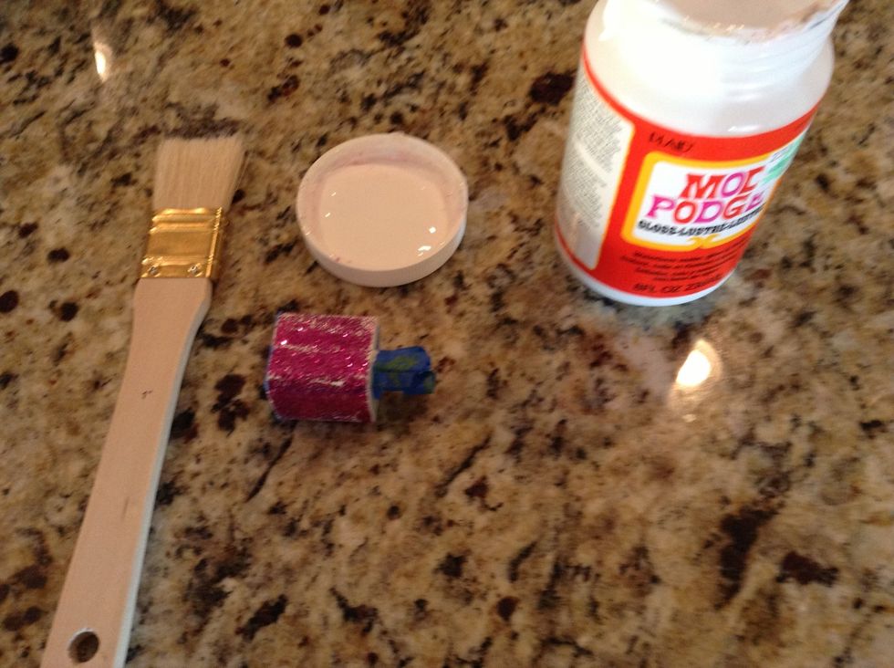 Now take your brush and put the mod-podge on the charger