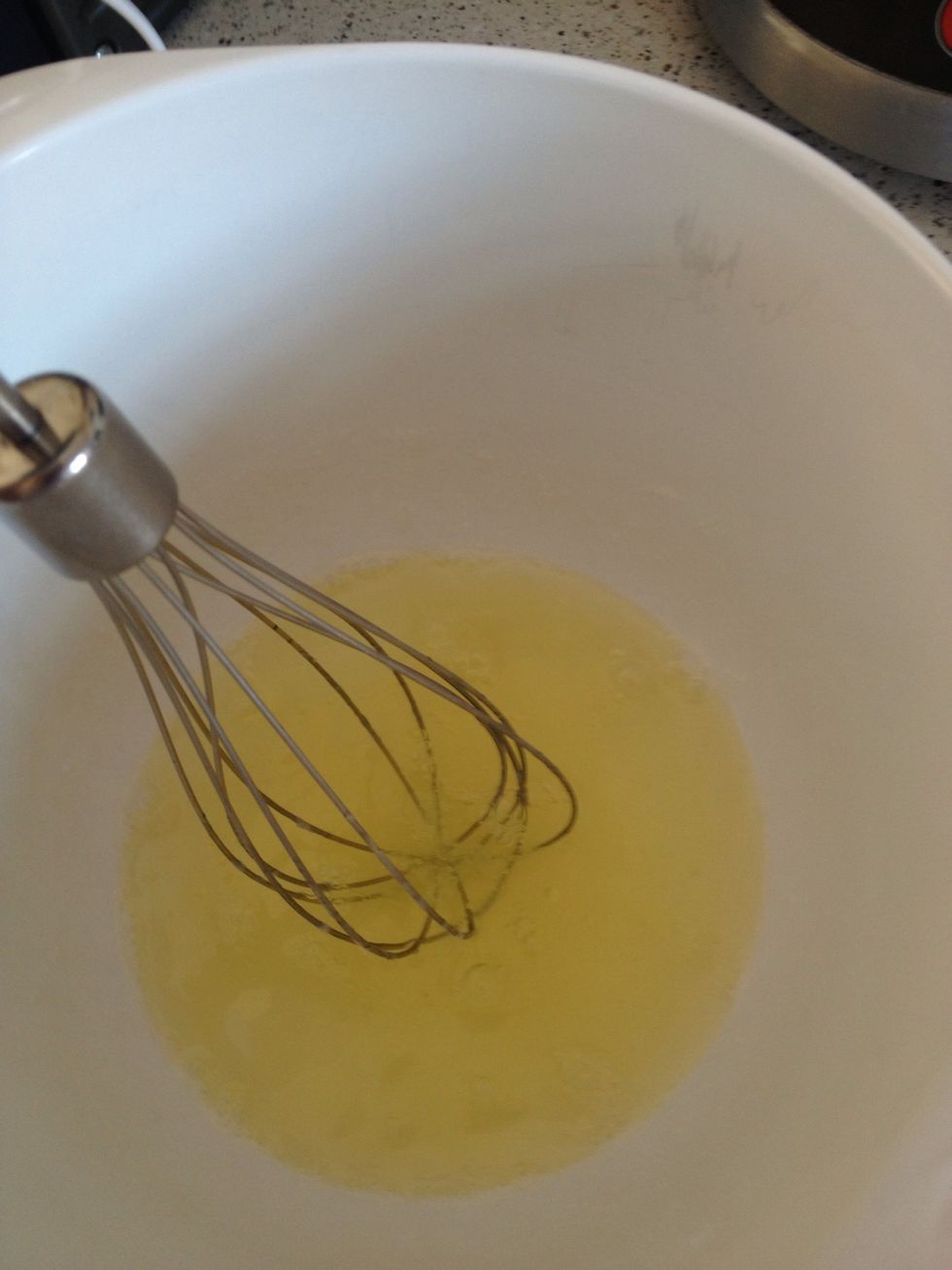 Now take your egg white and 1 tbsp. Sugar. And mix.
