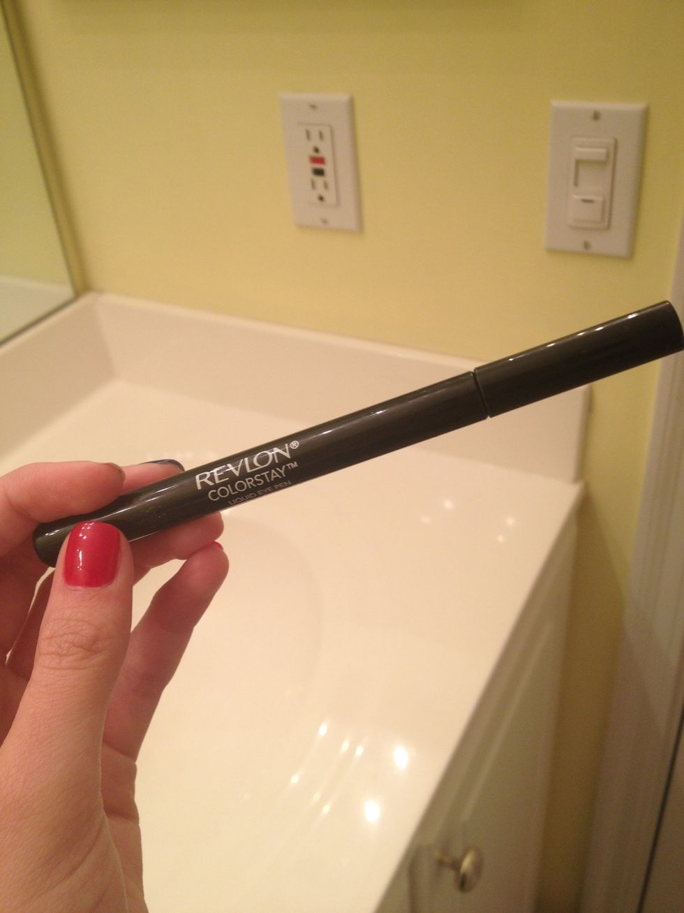 Now, take your eyeliner and line the top lid and half of the bottom. I use a marker thing because I can't do regular liquid..oops.