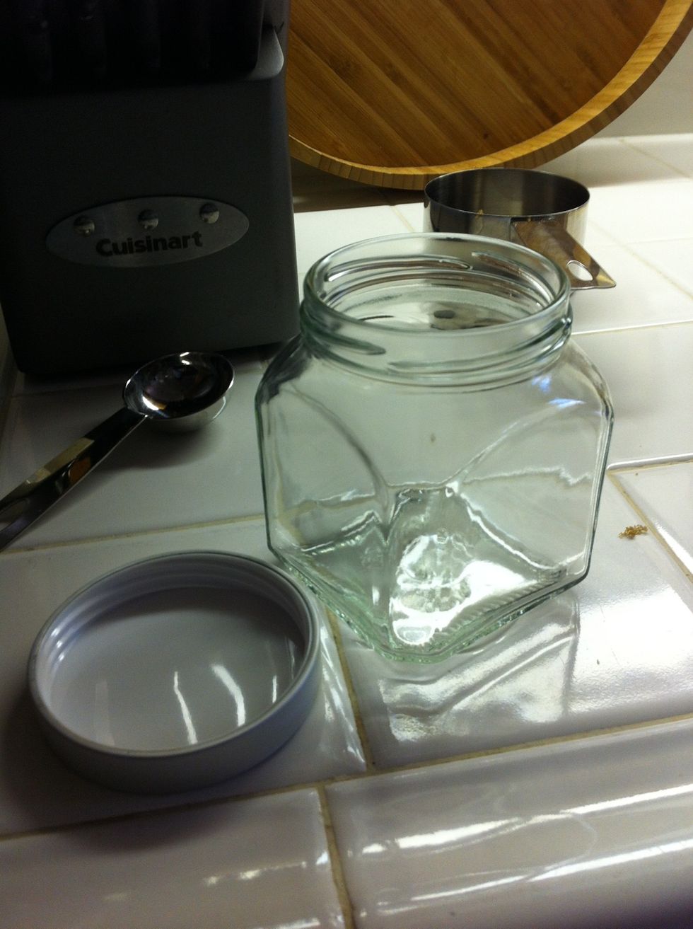 Now take your fancy jar and begin adding the scrub!
