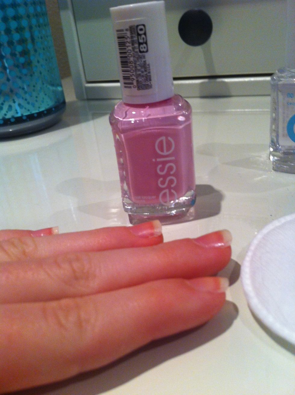 Now take your favorite nail polish and make 3 simple strokes on the nail. One down the center, one on the right side, and one on the left side.