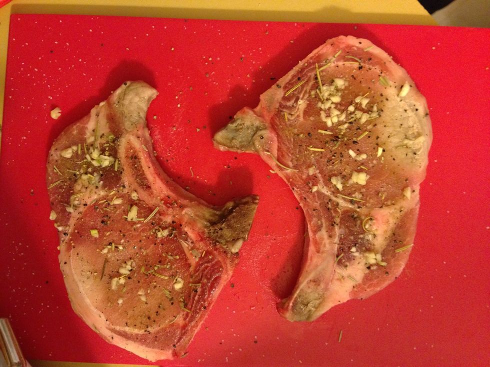 Now take your garlic and rub into the chops too. If you're going to make more chops just chop up some more garlic (about 3 small cloves per 2 chops).