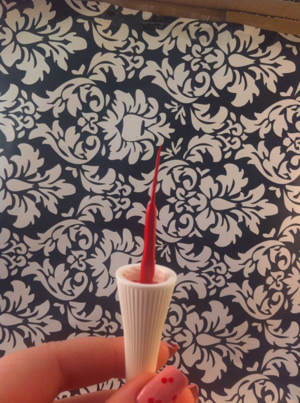 Now take your red striper and connect the dots in a triangular shape to create the hearts.