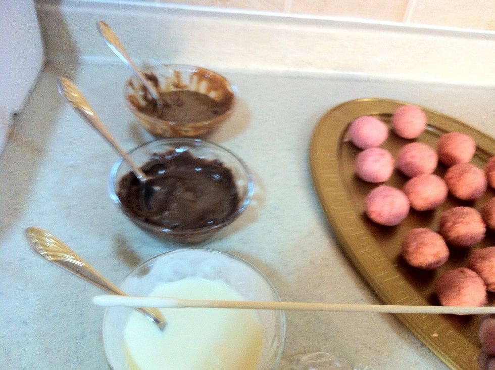 Now take your stick and dip it in your meled chocolate ..