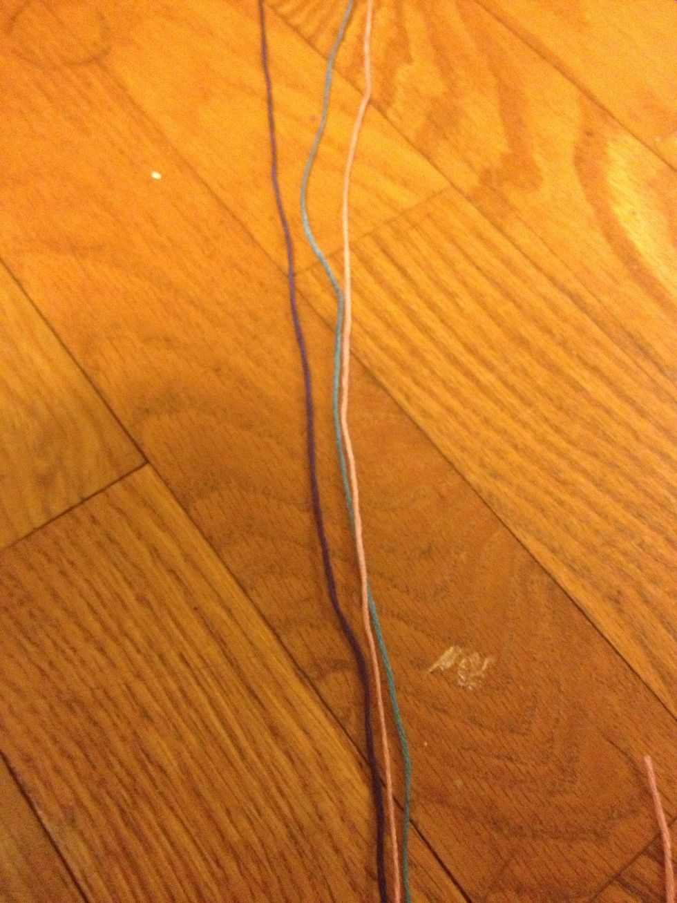 Now take your third and final strand and cut it the same length as the other two