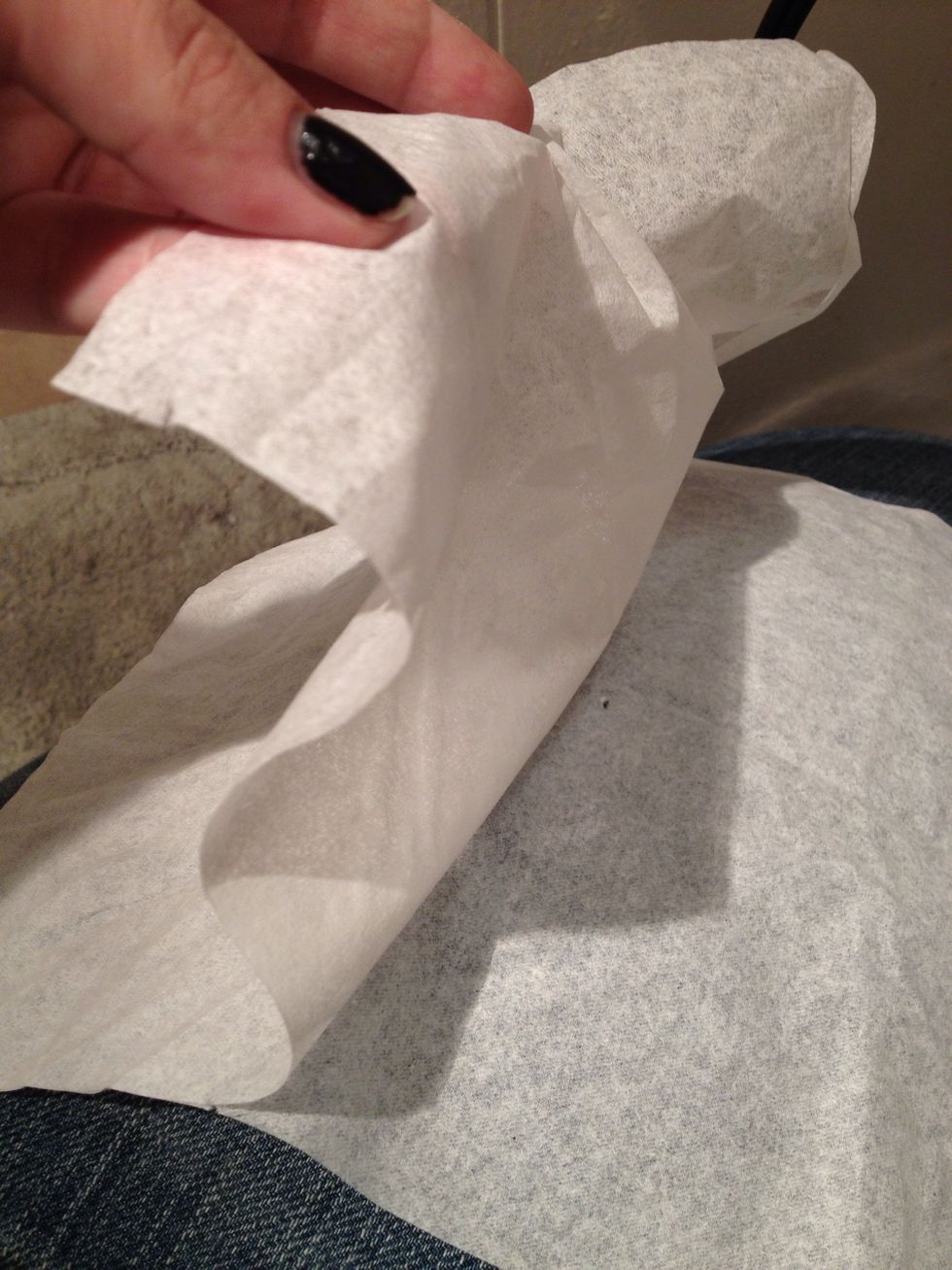 Now take your tissue paper and peel the sheet to create two thinner layers