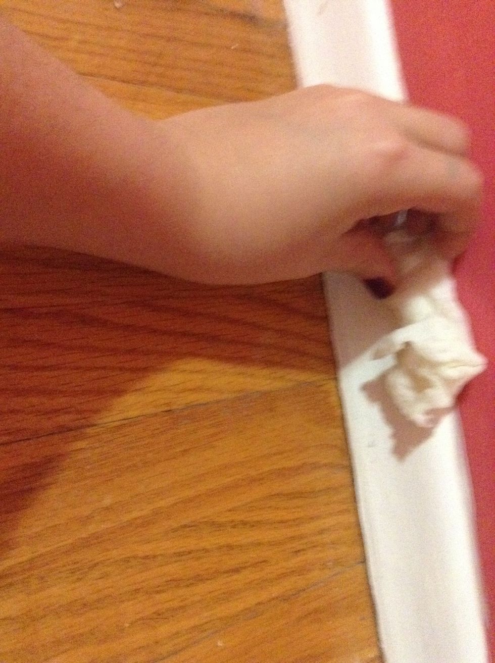 Now take your wet paper towel and wipe it