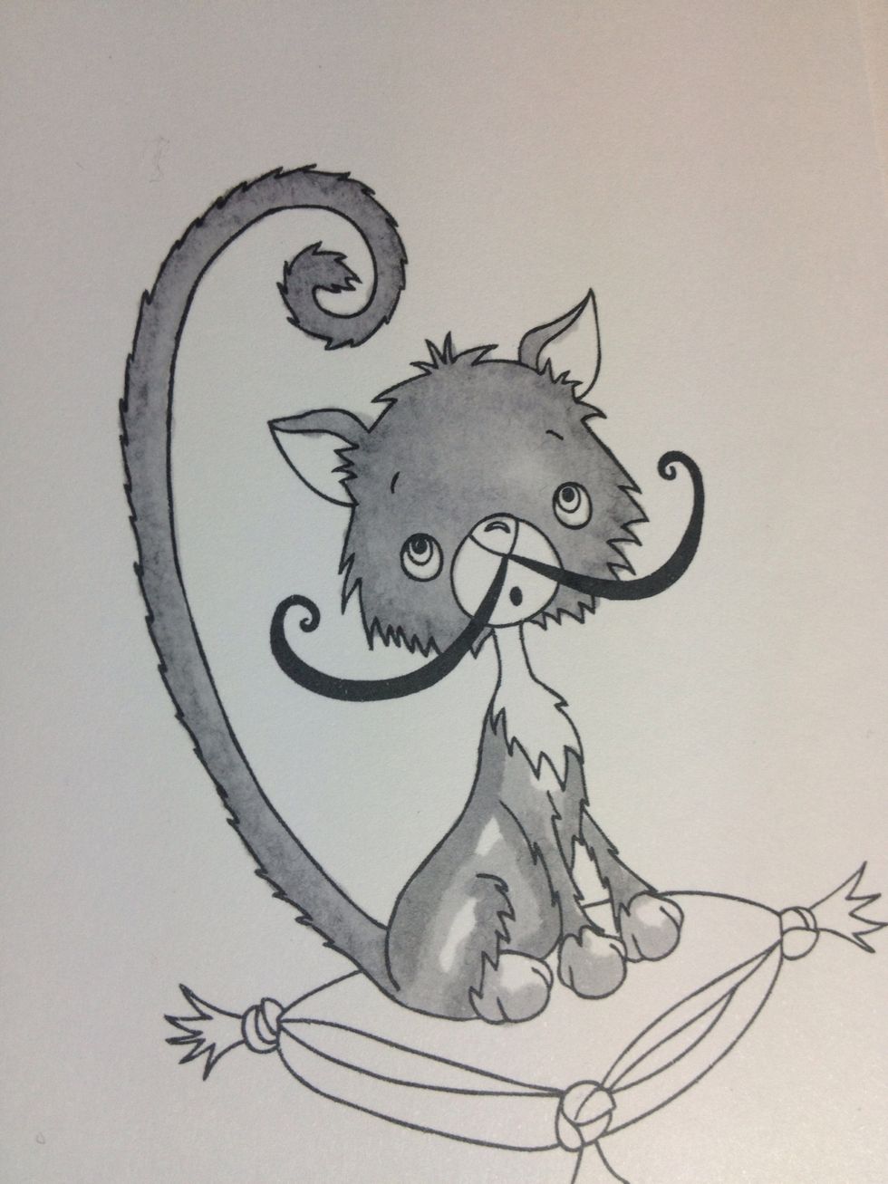 Now taking your lightest grey, start to go over the two shades. In small circular motions blend the two darker colours. Don't worry about the ink bleeding over the edge this can fixed.