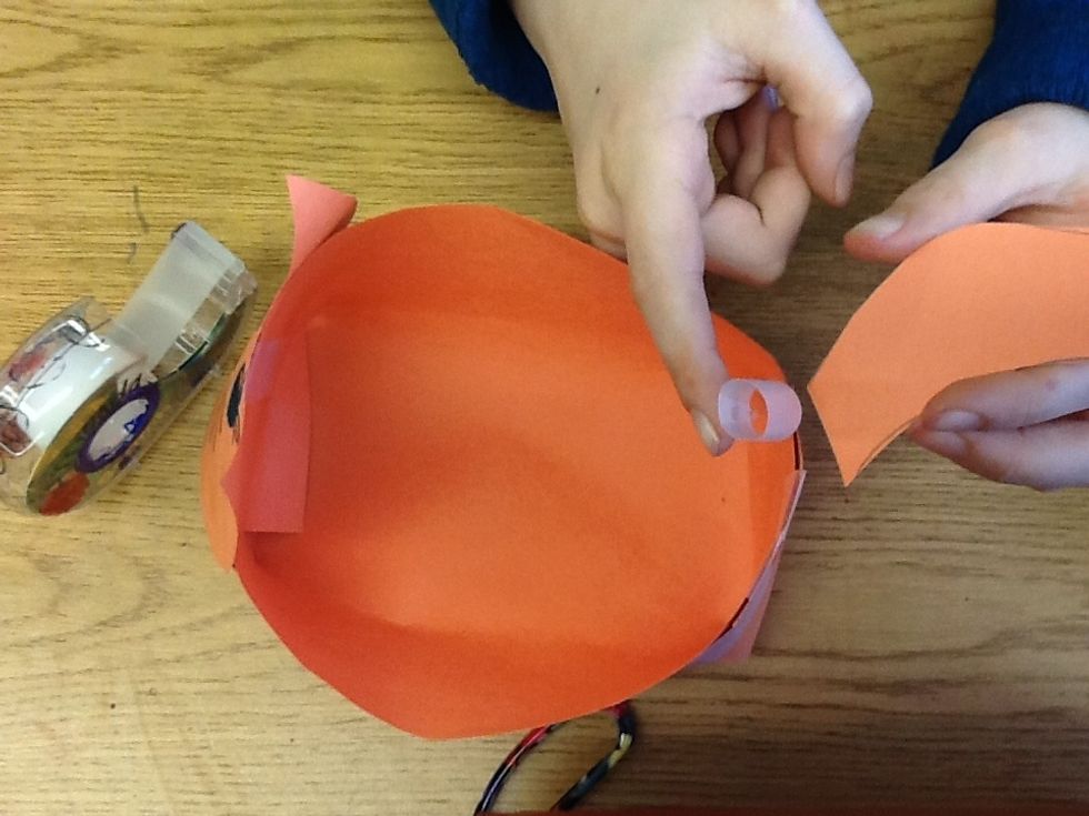 Now tape a tail on to the back side of the basket.