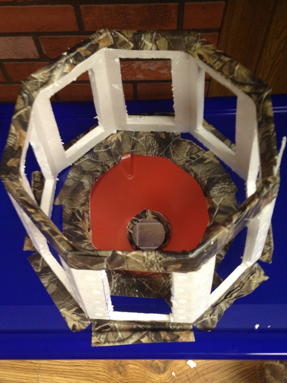 Now tape on the baffles over the funnel.