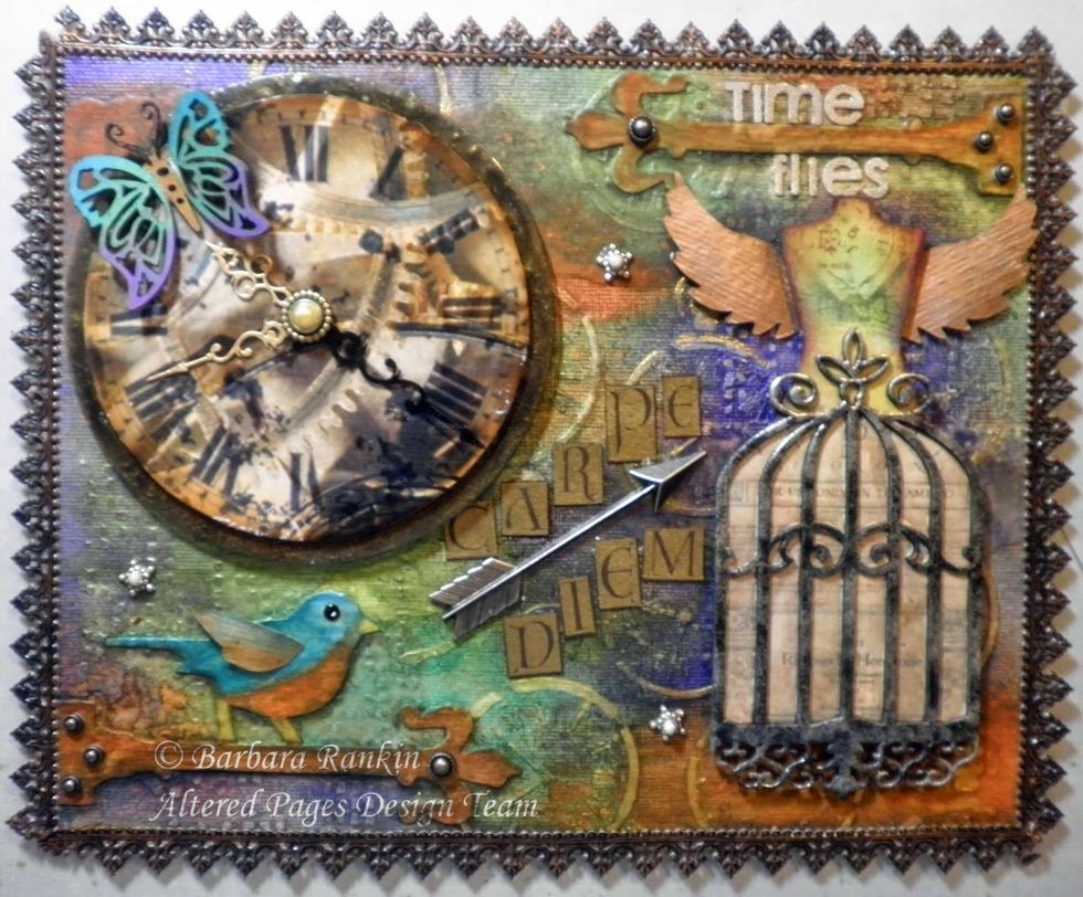 Now that I'm happy with my background, it is time to start adding focal pieces. Refer to the photo of the finished canvas for placement. The following pictures are some closeups of select areas.