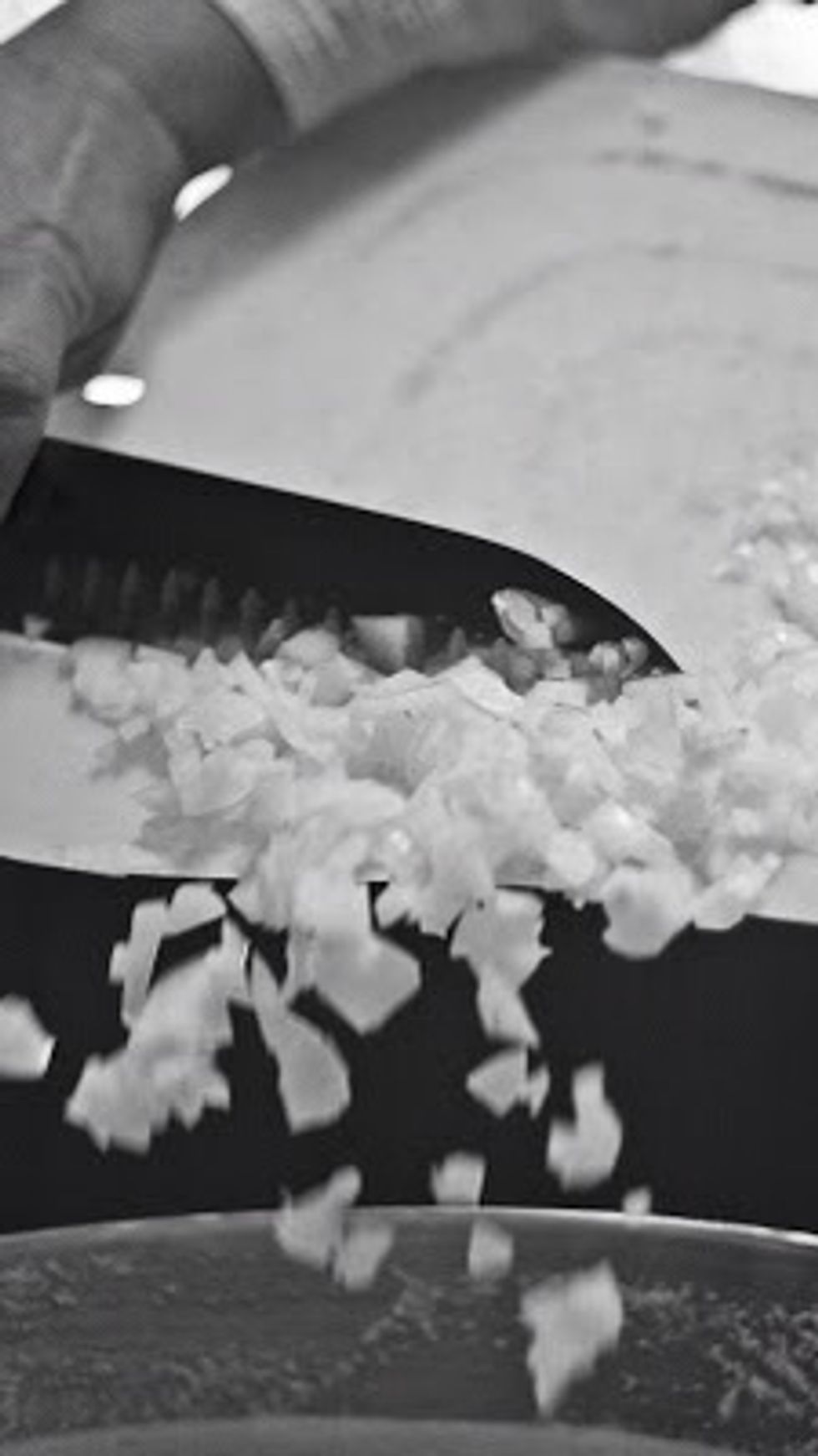 Now that the batter is ground add in: 1 large onion finely chopped.