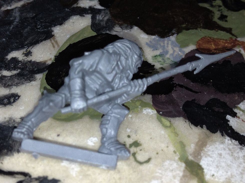 Now that the miniature is detached from the sprue, it should look something like this. There are still mould-lines to file off, and then it'll be ready to attach to its round slotta-base.