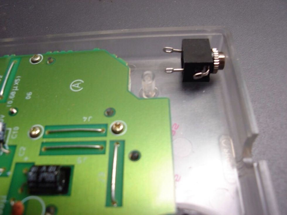 Now that we have the space in the case, decide where you're going to mount the 1/8" jack. You don't have a lot of room to work with, so get the jack as far on the edge of the case as you can.