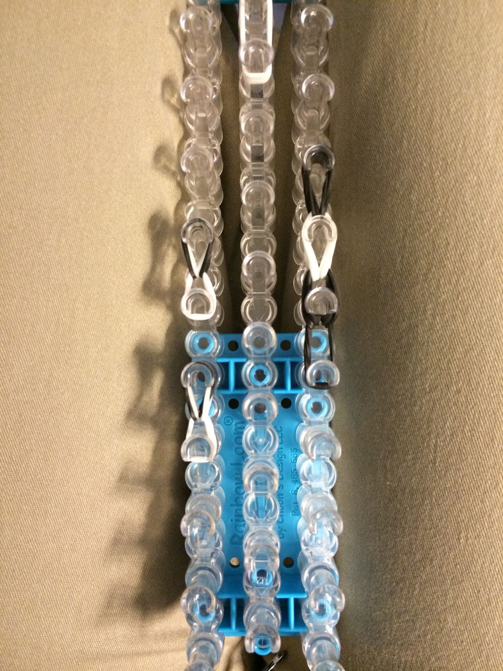 Now that we have the tail,ears and nose looped let's take them off our loom.