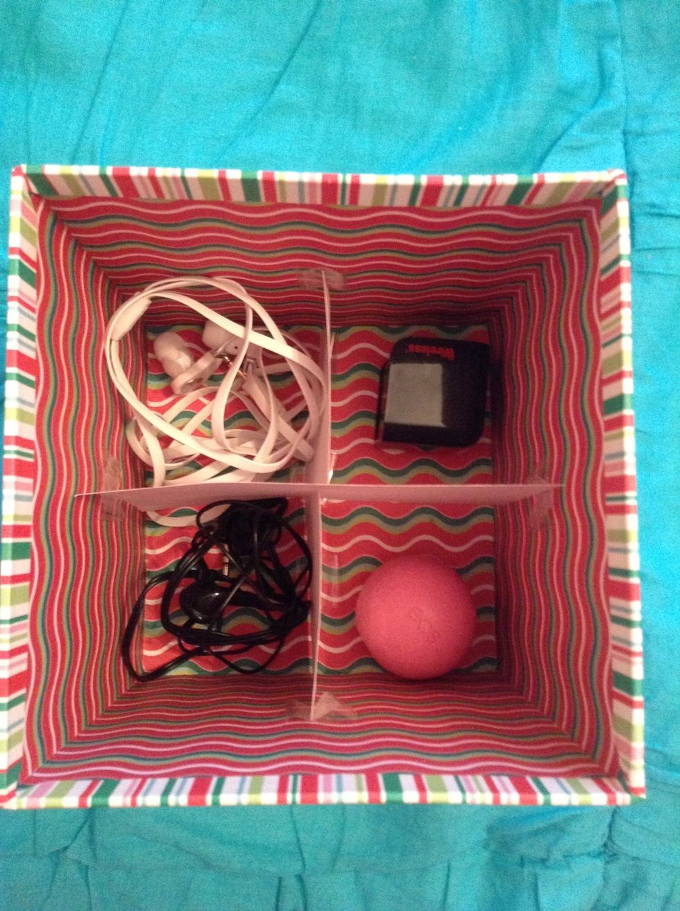 Now that you are finished making this handy little holder, insert your items into the slots.