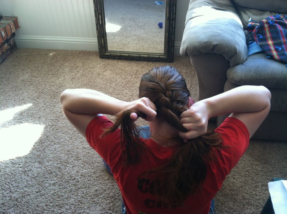Now that you have picked up all your hair do a regular braid to the ends of your hair