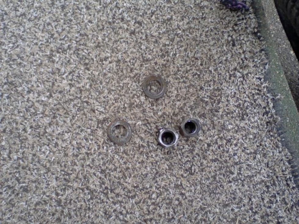 Now that you have the right size wrench you can now take off both the lug nuts and washers.