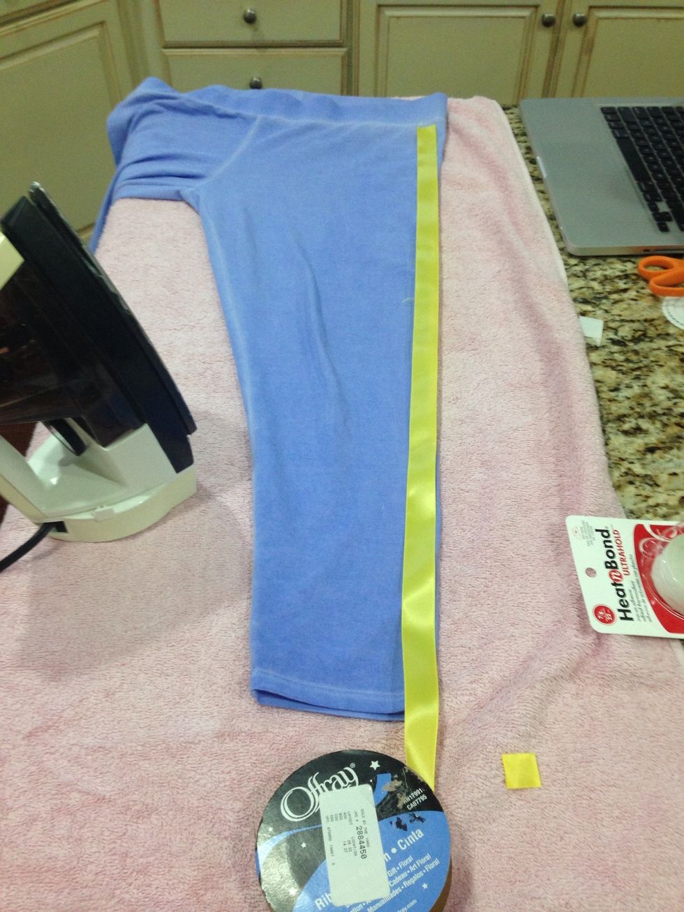 Now that you have your length cut the yellow ribbon at the end where you want it. Make sure to leave extra length in case you fudge it.