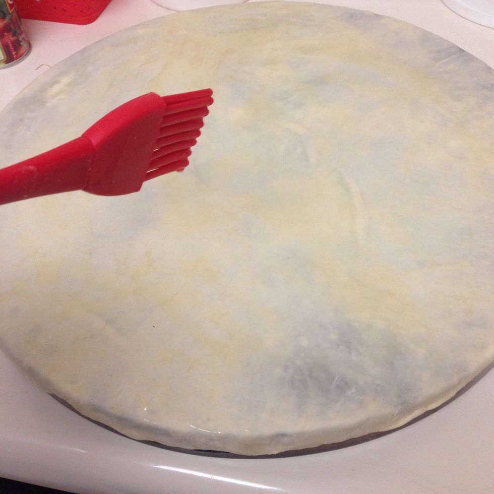 Now that you large sheet, sprinkle some melted butter with  some black seeds