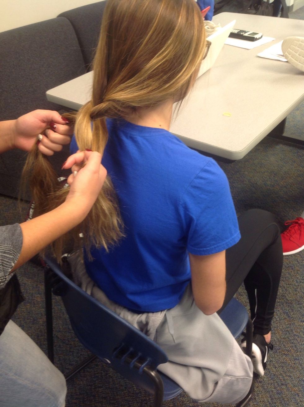 Now that you've crossed one over repeats step 4 on the other side and pause to make sure it looks right. Don't forget to cross over the top!