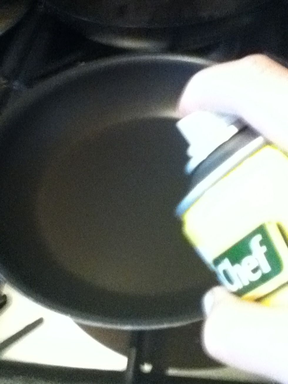 Now that you've got your pancake batter it's time to get cooking! So get out your pan a spray some olive oil all round! Really try and get some into the corners of the pan, it's where they stick most!