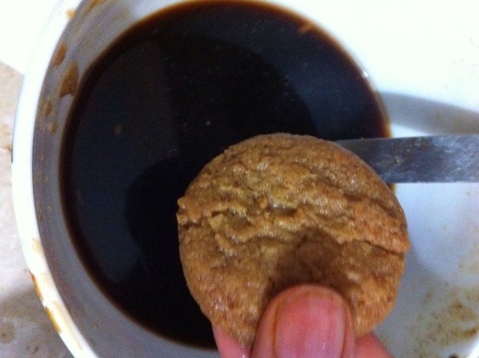 Now the 2nd cookie layer comes. Dip your cookies into the coffee syrup and start layering on top of the cream cheese layer. Reheat the coffee syrup wee bit if it's cooled down