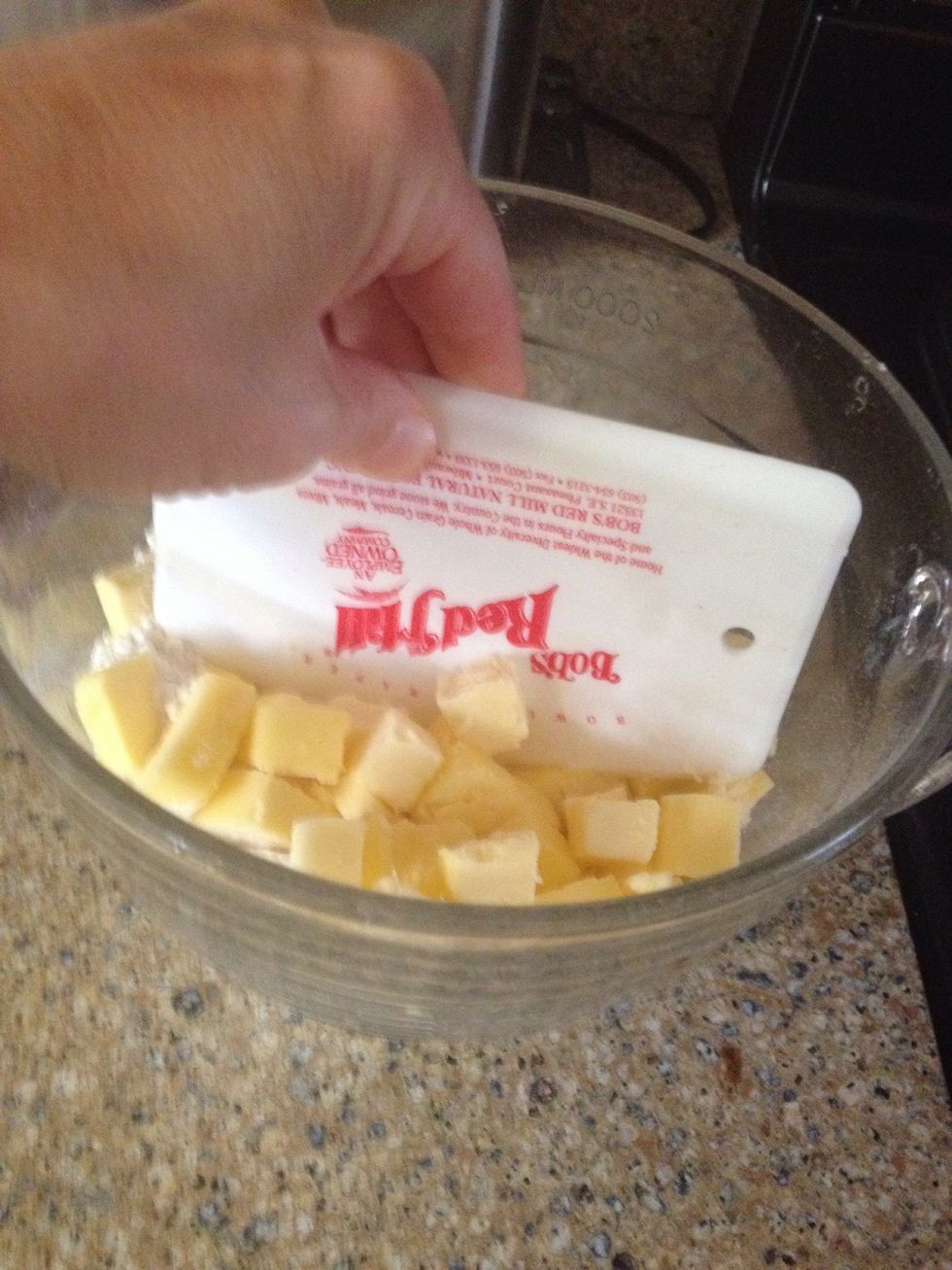 Now the butter must be cut in, so use a pastry cutter or whatever you want to cut in the butter.