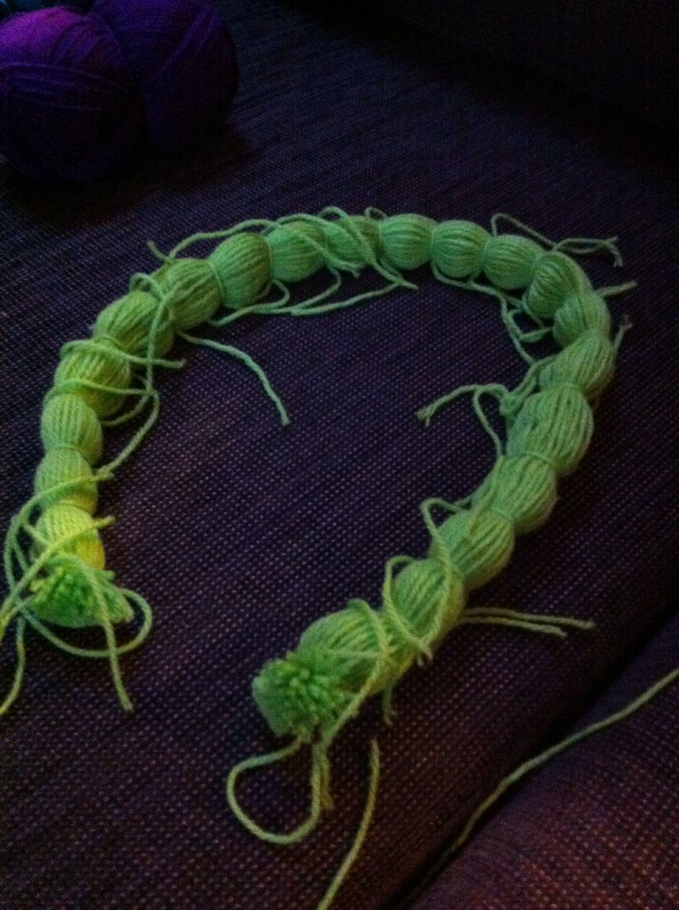 Now the caterpillar is a long length, go through and tightly double knot the sections.