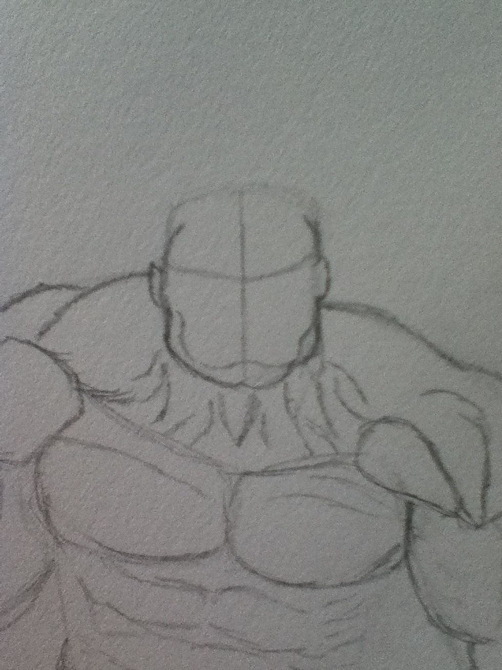 Now the face. The hulk had a square head and a butt chin (he does) so here I'm just showing the head with lines for the eyes and nose with his muscle lines and ears.