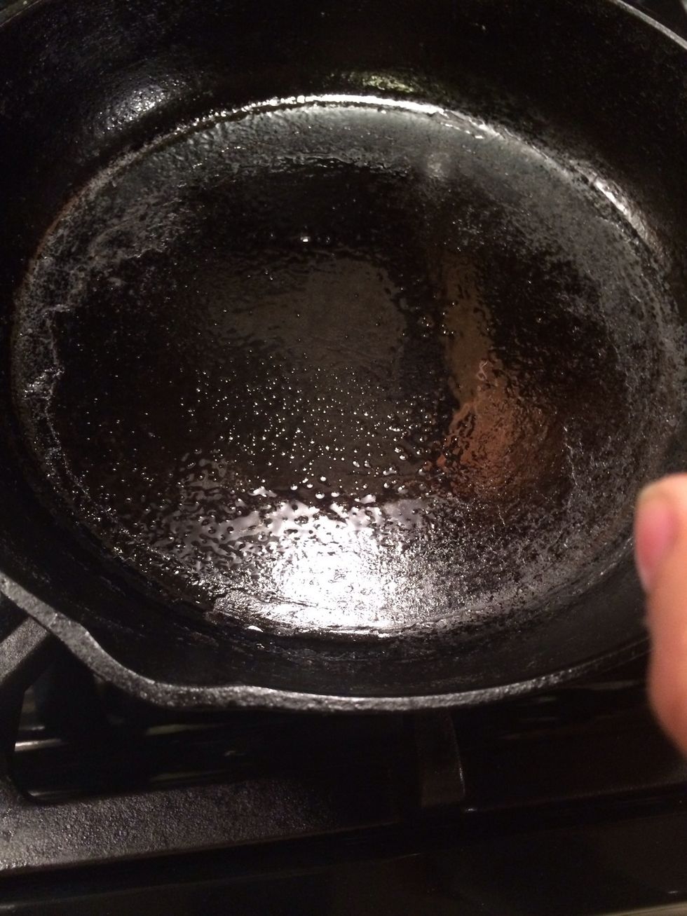 Now the first method i will show you is the stove top method. Take a cast iron pan and set it over medium high heat. If you don't have a cast iron pan use a non stick pan no biggy.