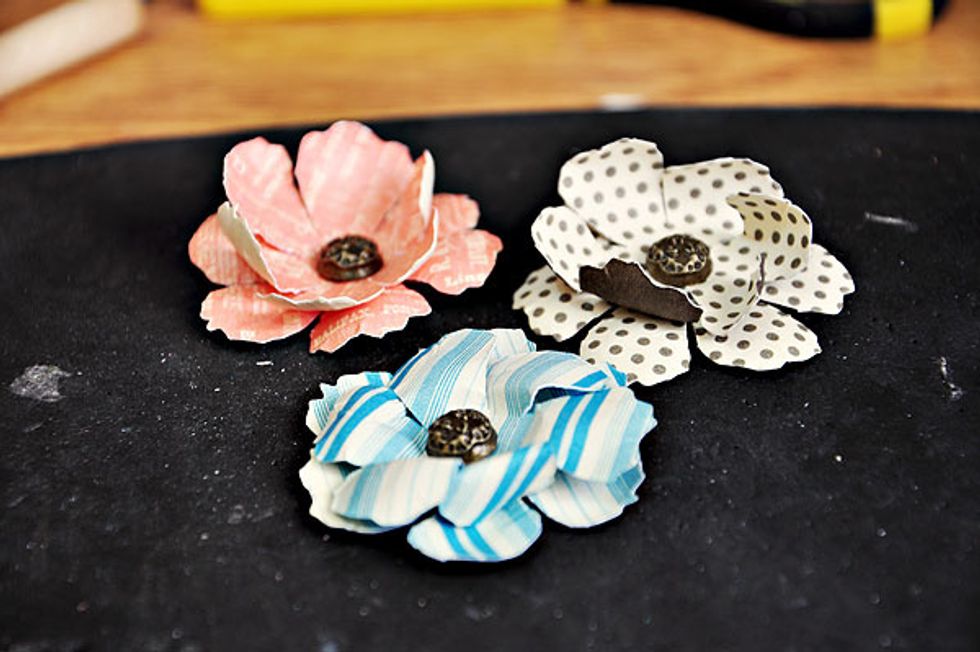 Now the flowers are ready to be used as embellishments to the pages. Tip: alternate the placement of the flowers on each page to avoid crowding and unnecessary bulk on the same place.