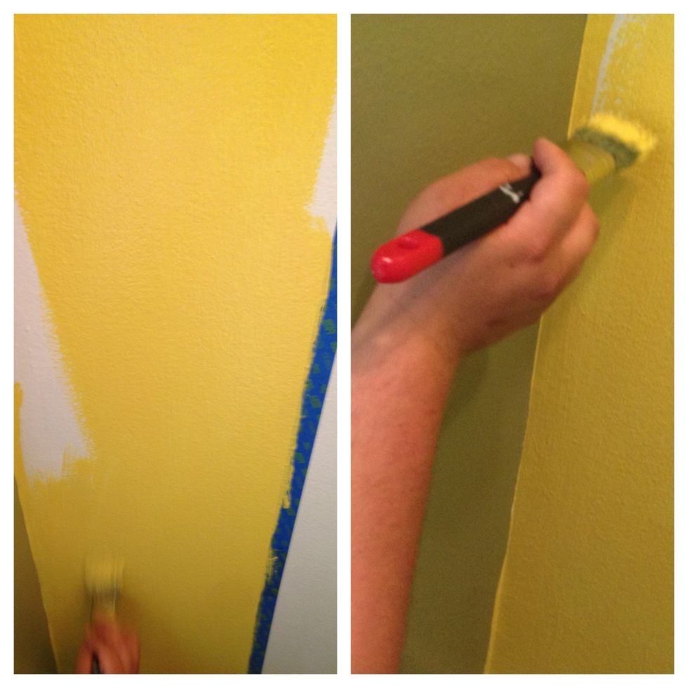 now, the FUN part! PAINT! we used paint brushes because our bathroom is so small, but if you have a large/tall enough space, use the roller and extension. you can go over the tape a bit, just be aware