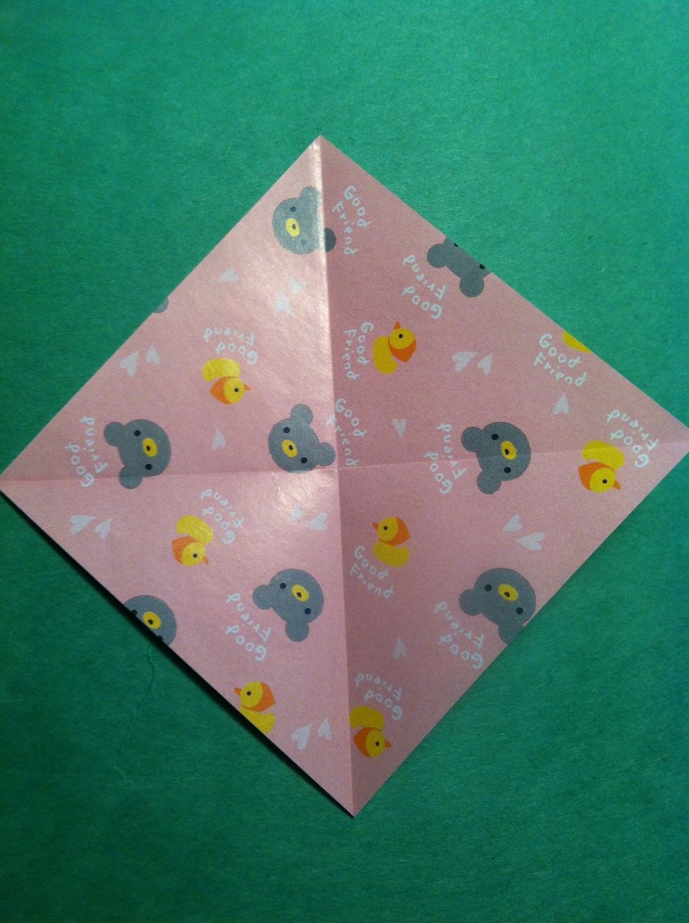 Now the head, which should be white. I used 3 inch square again. Fold diagonally both directions as the creases show.