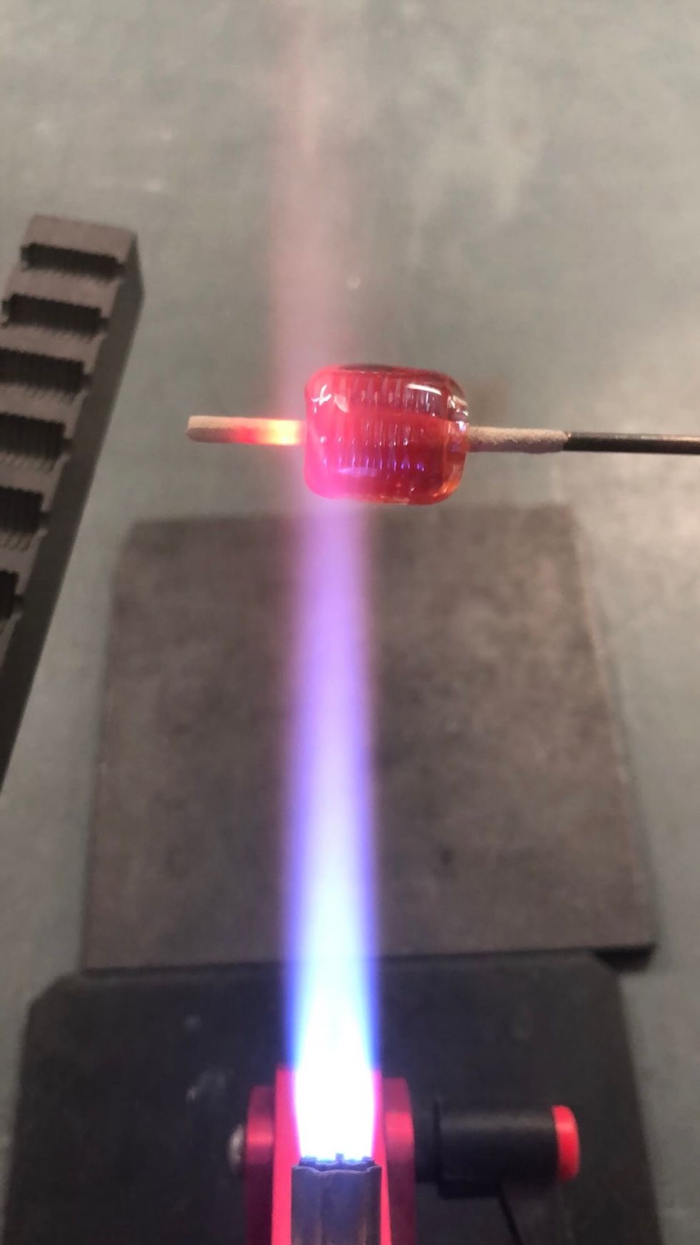 Next, we will apply the first clear encasement layer. Stripe hot clear