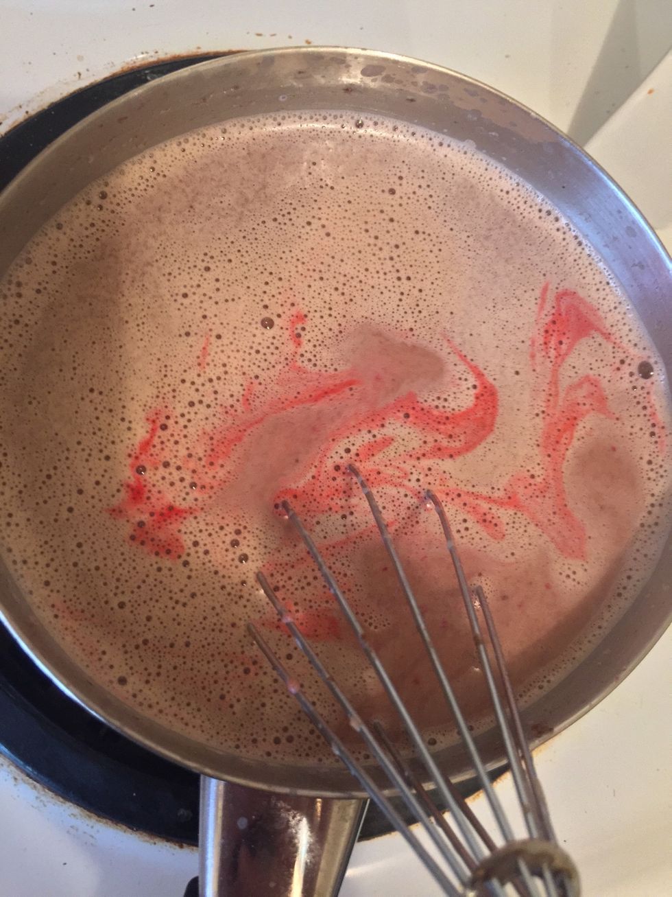 Now, the magic. Add your red food colouring, I did 5 drops at a time, mixed it, then repeated until desired colour