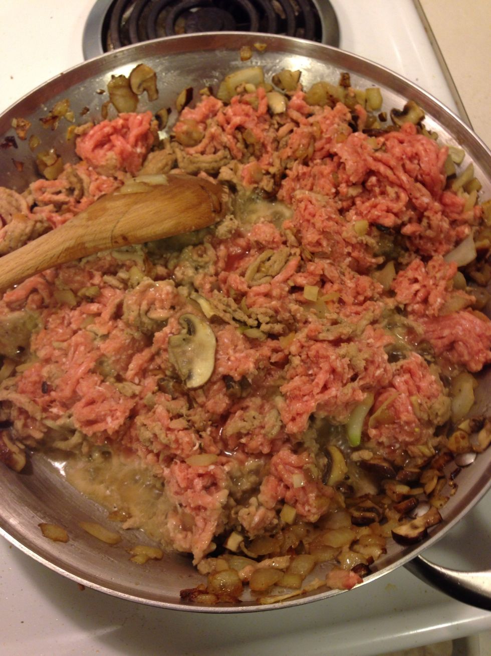 Now the meat is about half way cooked, about 6 minutes. Now add your seasonings ->