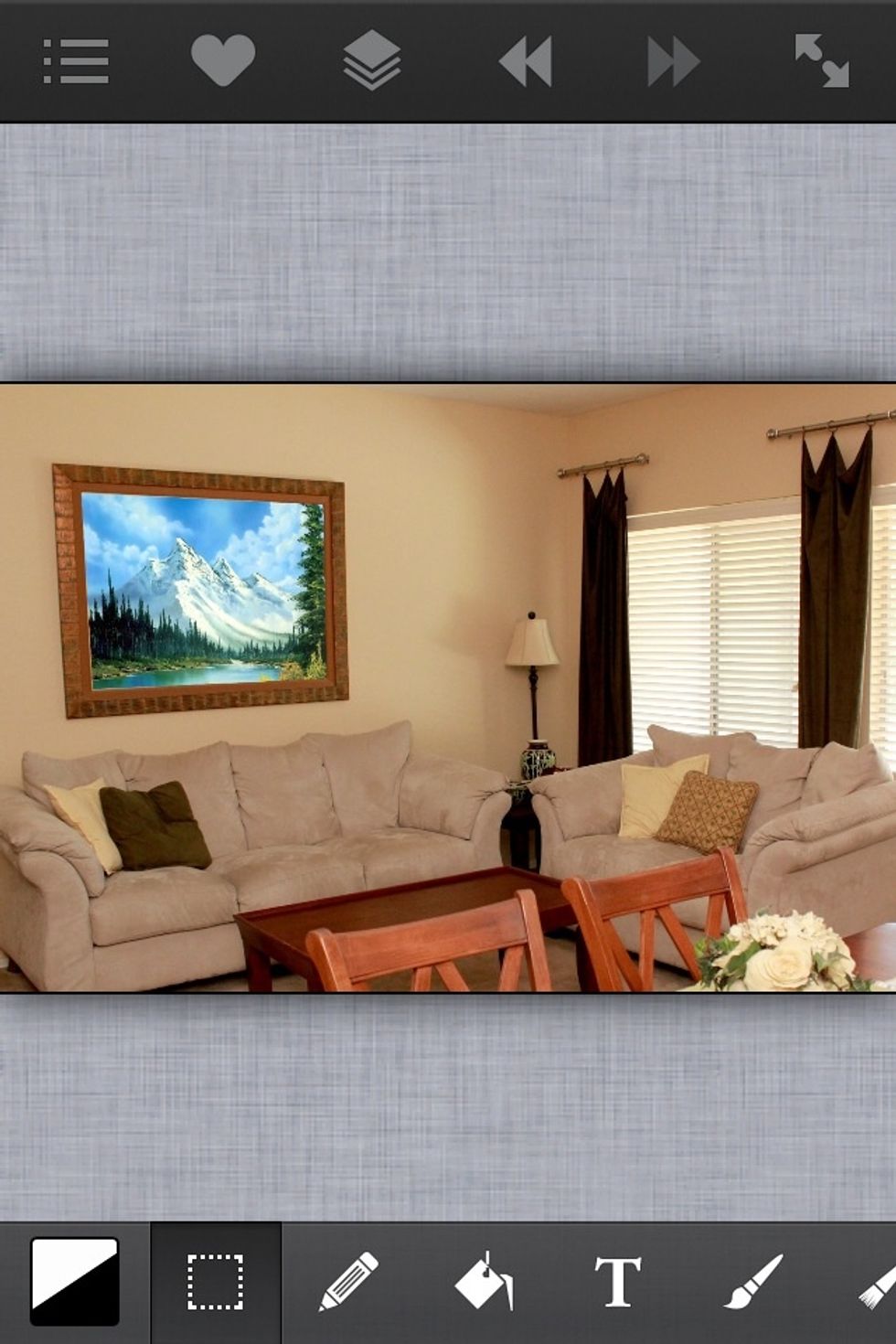 Now the new picture is in the frame. But in this case the lighting of the new painting doesn't really match the lighting of this image. So as a bonus to this guide, here's a tip to fix this.