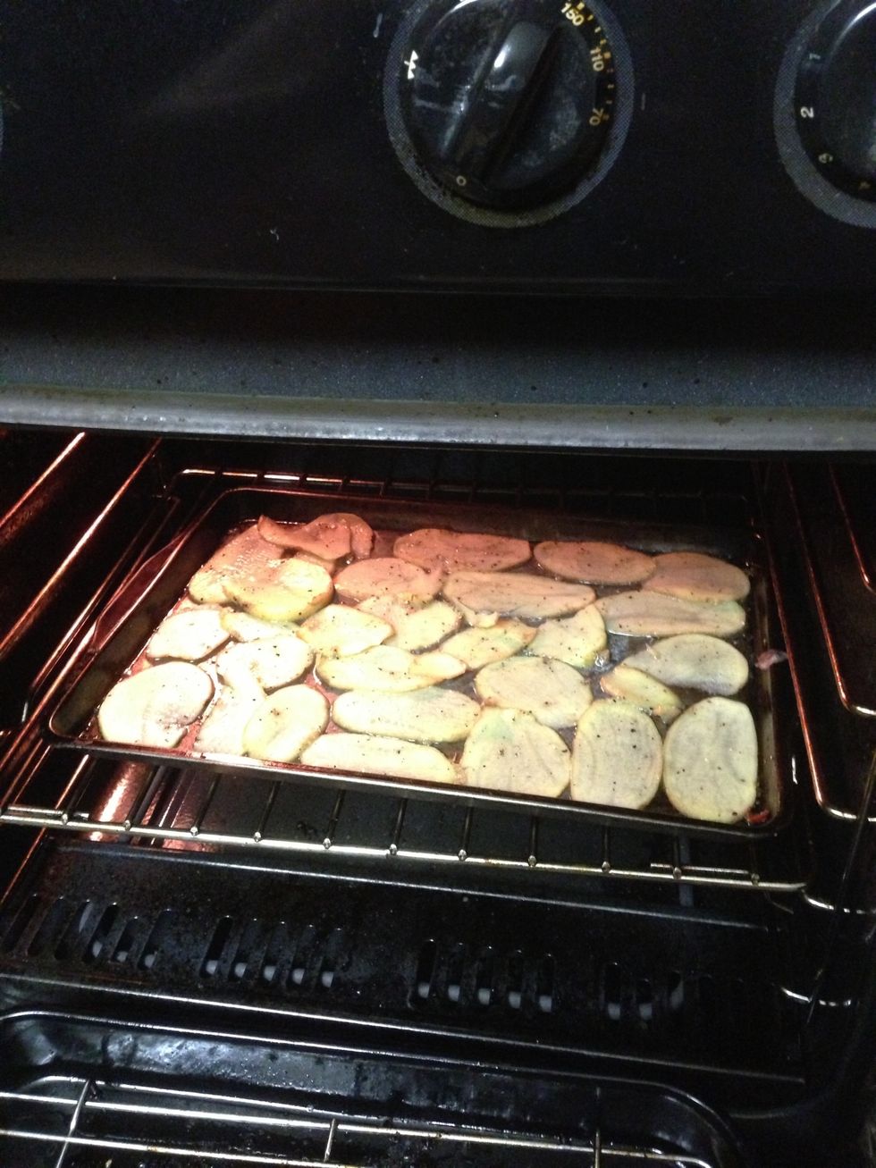 Now the potatoes go in put oven on bake again at around 200 degrees Celsius for around 5-10 minutes dependent on thickness