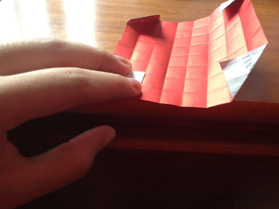 Now the real folding begins! Fold all four corners of your square.