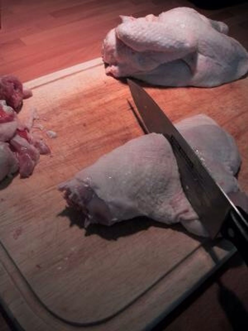 Now the remainder of the chicken in half